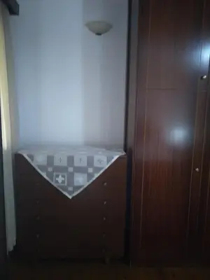 a closet with a glass shelf in a room at House of dreams in Rhodes Town