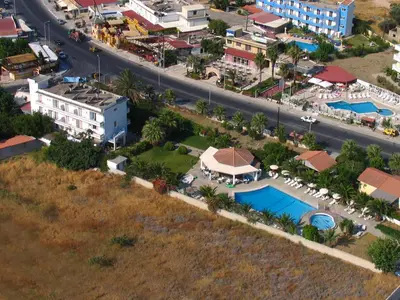 an aerial view of a city with a road at Faliro Hotel in Faliraki