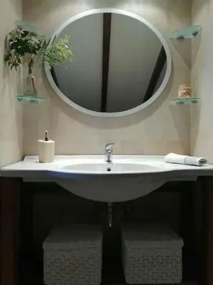 a bathroom with a white sink and a mirror at Elektra Apartment-Kallithea in Kallithea Rhodes