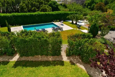 an aerial view of a garden with a swimming pool at Villa Iasama in Rhodes Town