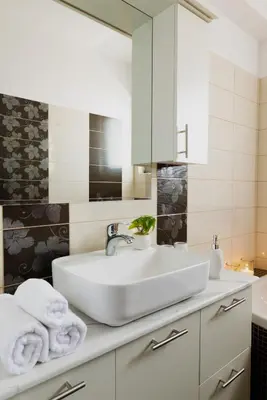 a bathroom with a white sink and a mirror at Odysseia Stay Pool & Private Jacuzzi 2min Beach in Kremasti