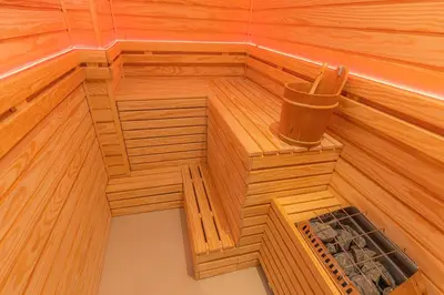 an inside view of a wooden sauna at City Compass Luxury Villa in Faliraki