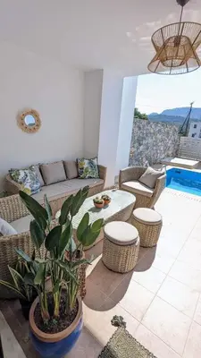 a living room with a couch and a table at Casa Christiana, Lardos in Lardos
