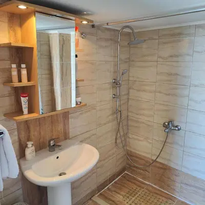 a bathroom with a sink and a shower at Casa di Rena Private House with Sunset View in Kritinía