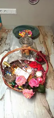 a glass table with flowers and candles on a table at Pasithea Luxury house in Archangelos