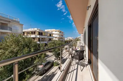 a balcony with a view of a street at Adelais Luxury City Apartment Rhodes in Rhodes Town