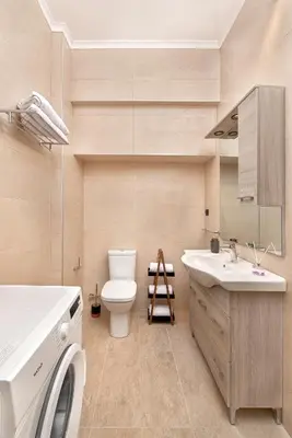 a bathroom with a toilet and a sink at Adelais Luxury City Apartment Rhodes in Rhodes Town