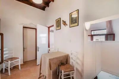 a white room with a table and two chairs at Kristinas View Studios in Rhodes Town