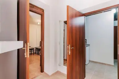 a door to a room with a dining room at Kristinas View Studios in Rhodes Town