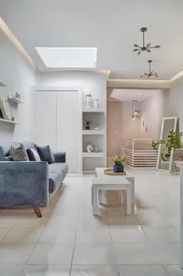 a living room with a couch and a table at Old Town Luxury Velvet Apartment in Rhodes Town