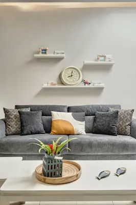 a living room with a couch and a table at Old Town Luxury Velvet Apartment in Rhodes Town
