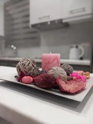 a plate of cookies and a candle on a counter at Kolymbia summer holidays in Kolimbia