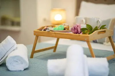 a tray with a plate of food on a table at Charavgi apartment 2 in Kremasti