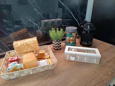 a box of bread and a box of food on a table at Seven Palms Central in Rhodes Town