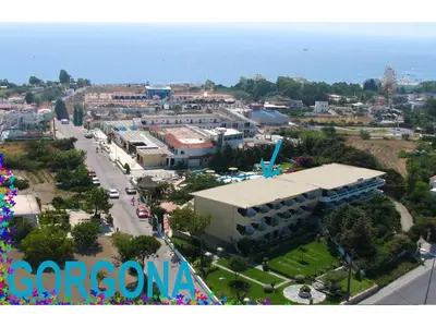 an aerial view of a city with the ocean at Gorgona Studios in Faliraki
