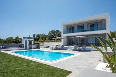 a view of a villa with a swimming pool at Melilia luxury villa in Gennadi