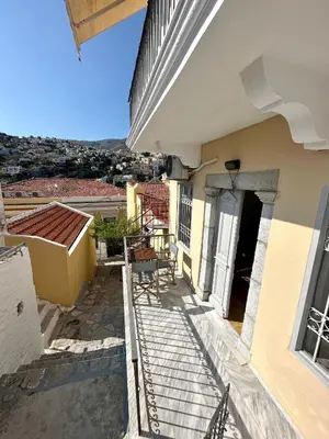 a view from the balcony of a house at Evangelia in Symi