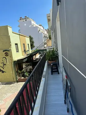 a balcony of a building with a railing and plants at JZ Boutique 2 in Rhodes Town