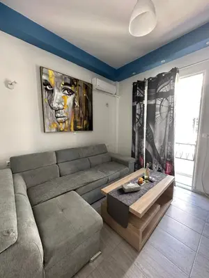 a living room with a couch and a coffee table at JZ Boutique 2 in Rhodes Town