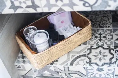a box filled with items sitting on a floor at Aelia studio in Symi