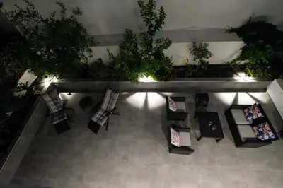 an overhead view of a restaurant with tables and chairs at Rhodes Retreat: Modern Comfort in Serene Luxury in Rhodes Town
