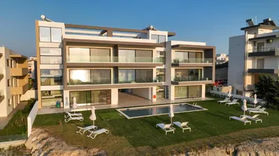 an aerial view of a building with a swimming pool at Aquarama Pool Apt. - Blue in Ixia