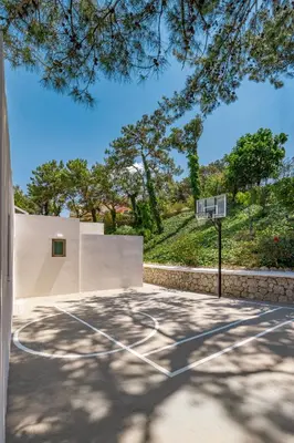 a basketball court with a basketball hoop at Aegean View Estate - Villa in Faliraki