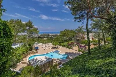 an aerial view of a resort with a swimming pool at Aegean View Estate - Villa in Faliraki
