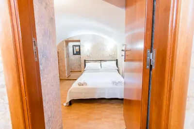 a bedroom with a bed in a room at EIRINI in Symi