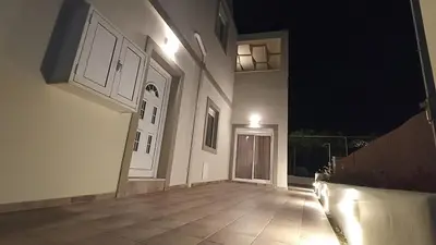 an empty hallway of a house at night at Dimitra - Kattavia surf houses in Kattavía