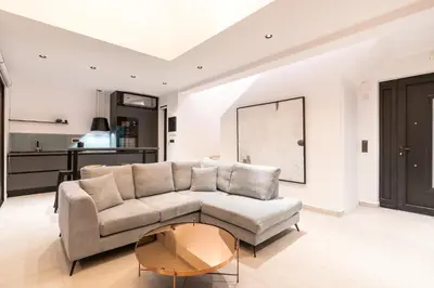 a living room with a couch and a table at D&R Boutique Villas D in Gennadi