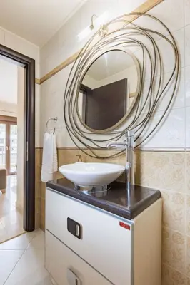 a bathroom with a sink and a mirror at Halide Luxury Villa in Ixia