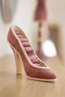 a pair of shoes sitting on a table at Panormos Luxury House in Rhodes Town