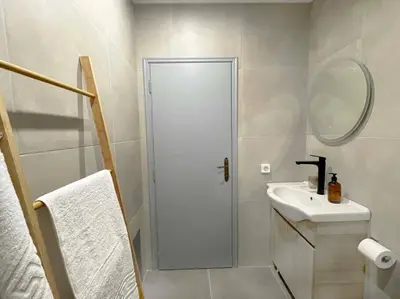 a bathroom with a shower and a sink at Gravity Ialysos Scandi Suite in Ialyssos