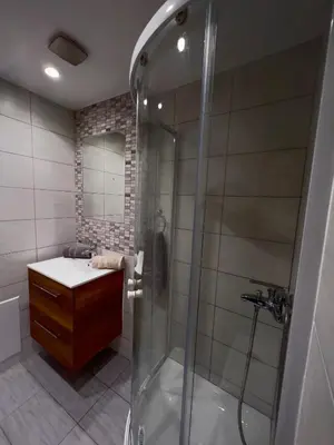 a bathroom with a shower and a sink at Villa AleNi Lindos in Líndos