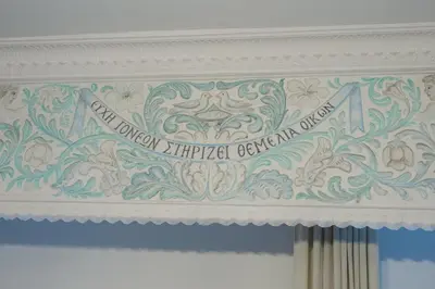 a white ceiling with a sign on top of it at Anemoessa Mansion in Rhodes Town