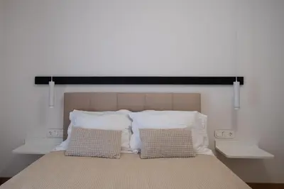 a bedroom with a bed with two pillows at Savvina's residence in Rhodes Town