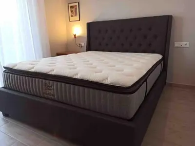 a mattress sitting on a bed in a room at Luxury cozy appartment in the city center in Rhodes Town