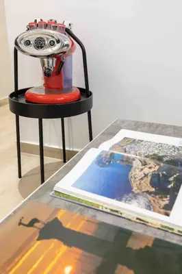 a table with a red object on top of a table at Luxury cozy appartment in the city center in Rhodes Town