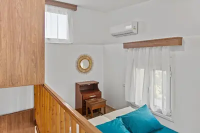 a living room with a couch and a window at Alonia Traditional House in Malona in Malona Village