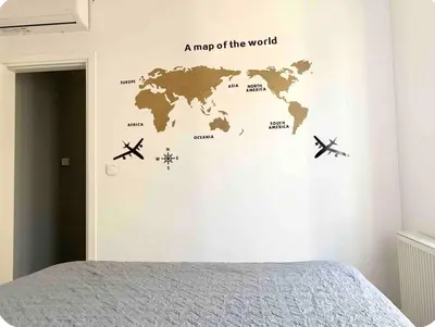 a map of the world with airplanes on a wall at Verde Casa luxury apartment close to old town in Rhodes Town