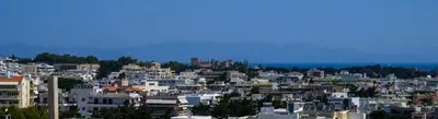 a view of a city with white buildings at Harama House - Seaview City Apt. in Rhodes Town
