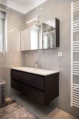 a bathroom with a sink and a mirror at Agnanti Sea View Villa in Koskinou