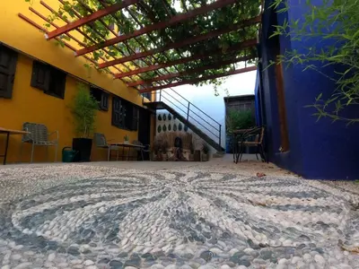 a patio with a star mosaic on the floor of a building at Rhodes Youth Hostel in Rhodes Town