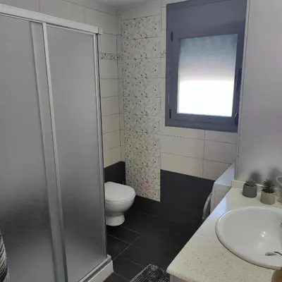 a bathroom with a toilet and a sink at Stamatina's Luxury Penthouse in Pastida Rhodes in Pastida