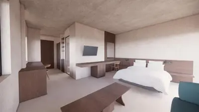 a bedroom with a bed and a desk at Elite Centre in Rhodes Town