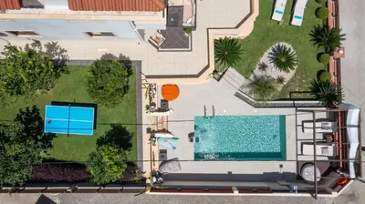 an overhead view of a pool in a yard at Amarilia House in Koskinou