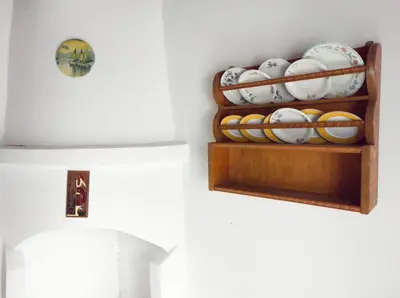 a shelf with a bunch of baseball balls on it at Ioanna Residence Kattavia in Kattavía