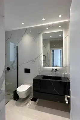 a bathroom with a sink and a toilet and a mirror at Ocean Pearl Sea View in Faliraki