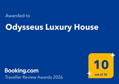 a yellow box with the words oxyssus library house at Odysseus Luxury House in Rhodes Town
